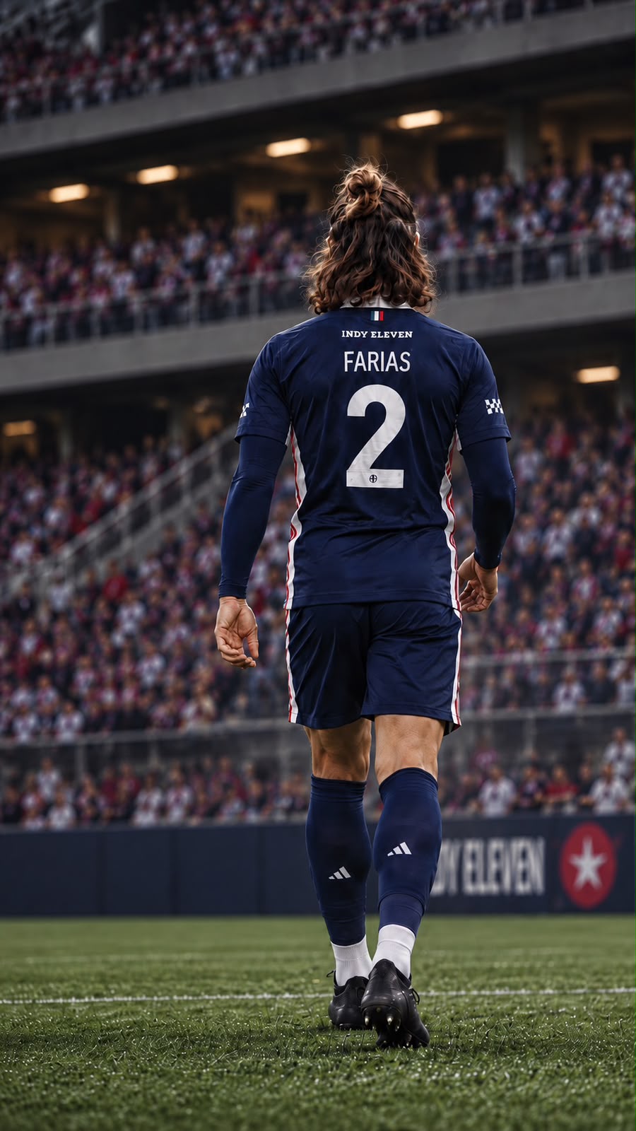 Lucas Farias de costas em campo com uniforme do Indy Eleven